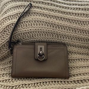 Genuine Leather Vince Camuto clutch. Lightly used but excellent condition.